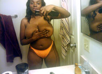 Hot bathroom mirror shot.